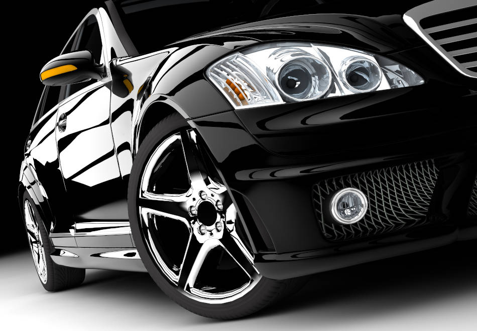 A modern and elegant black car illuminated